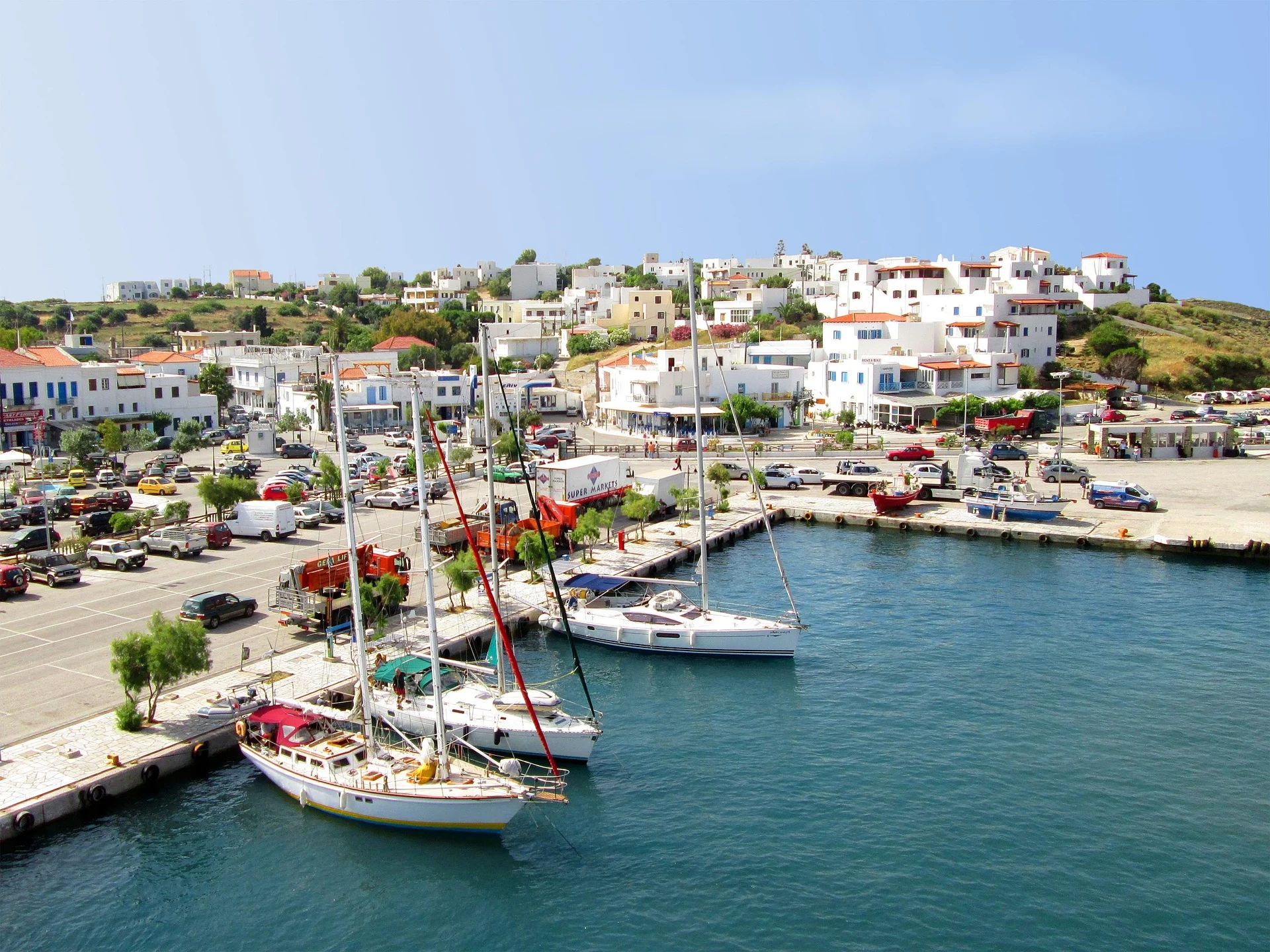 aerial of Cyclades, Greece, Andros with boats and harbor