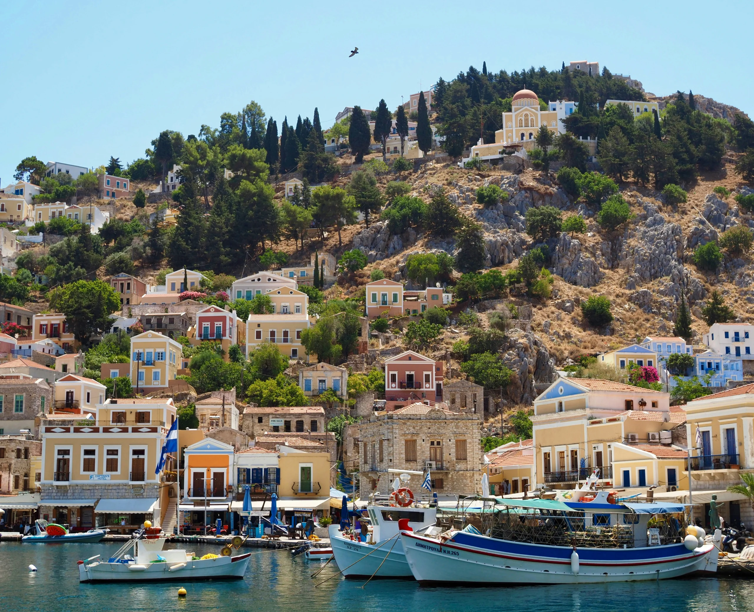 boats in harbor at Symi, in Dodecanese, Greece