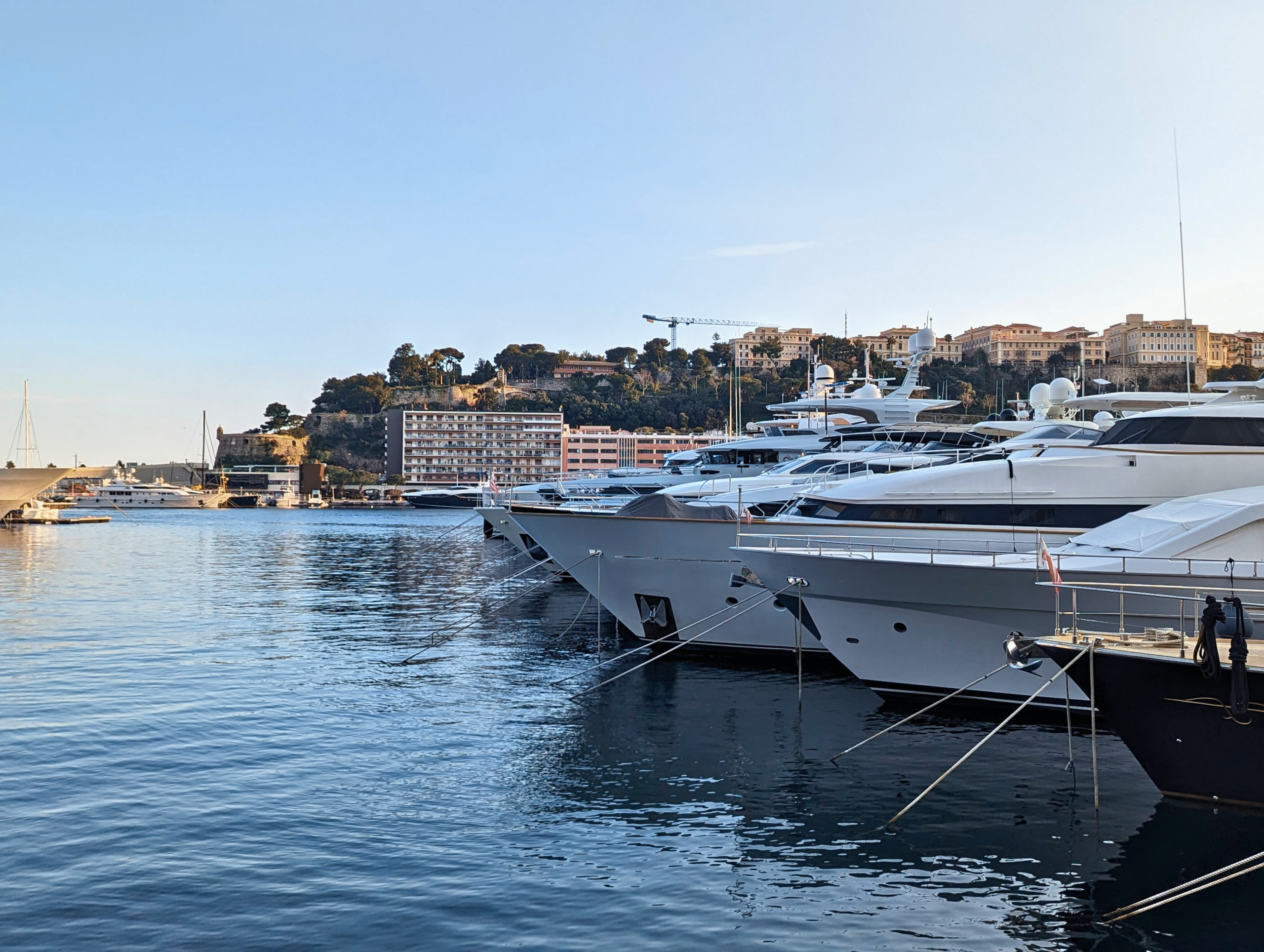 boats on the water with monaco in backdrop