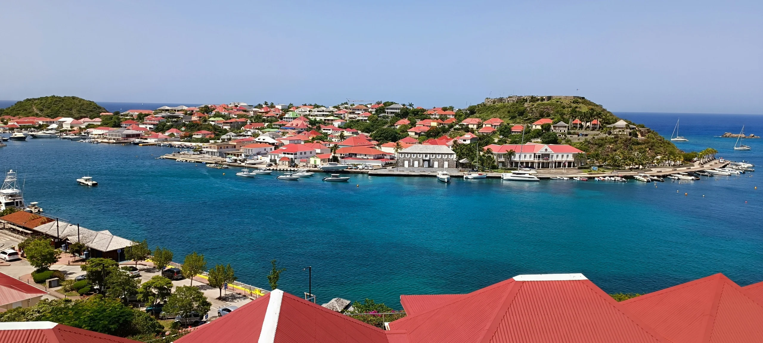 boats in the harbor in st barts