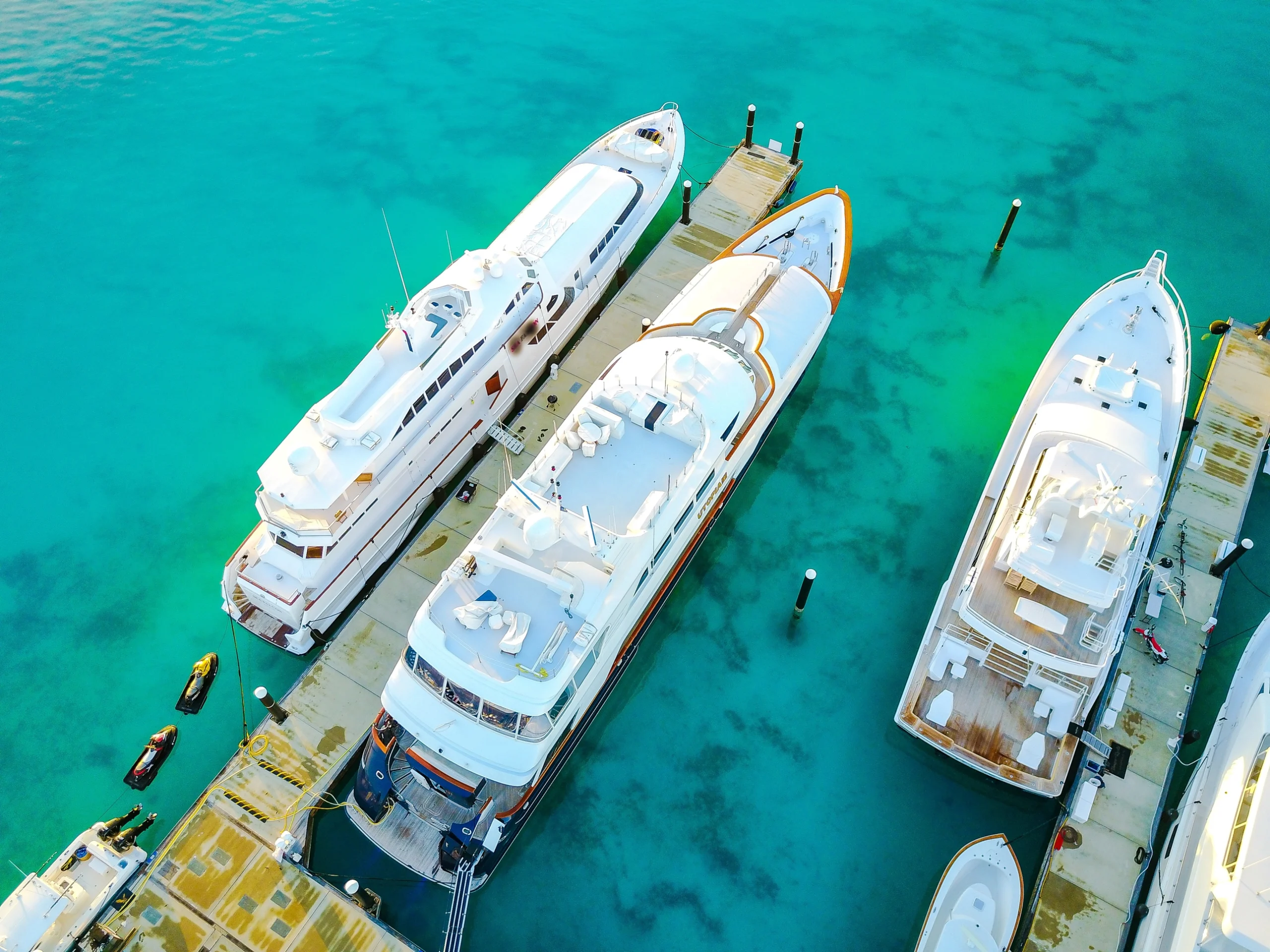 A high angle shot of luxury yachts at sunrise in the marina in Turks and Caicos.