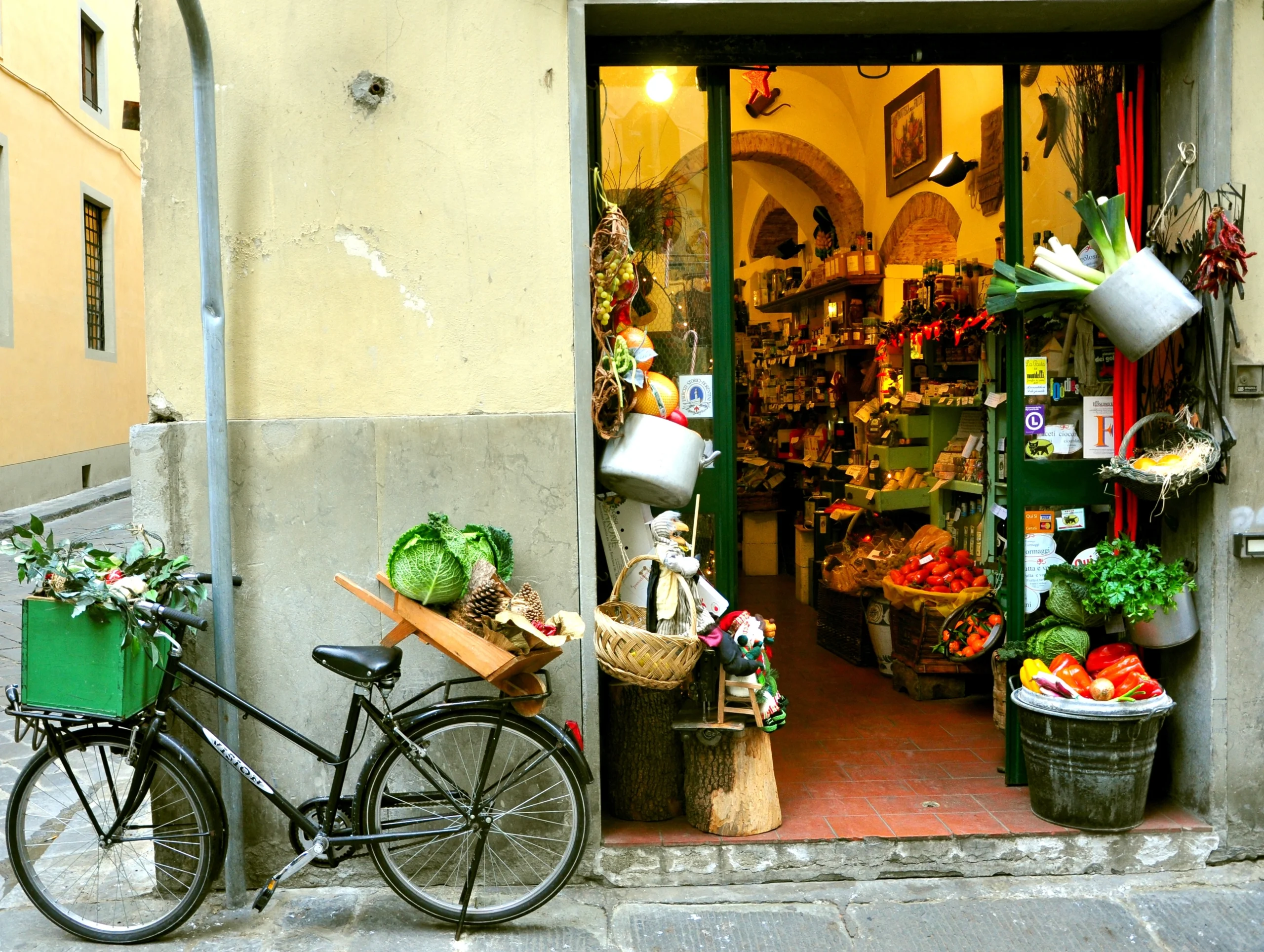 Typical small italian grocery shop in Florence, Italy.
