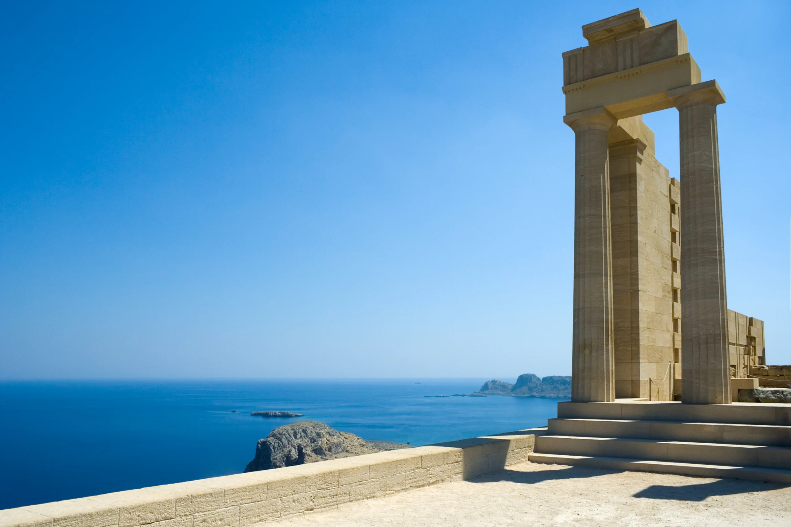 Partially rebuilt temple of Athena Lindia at the Acropolis of Lindos, Rhodes, Greece.