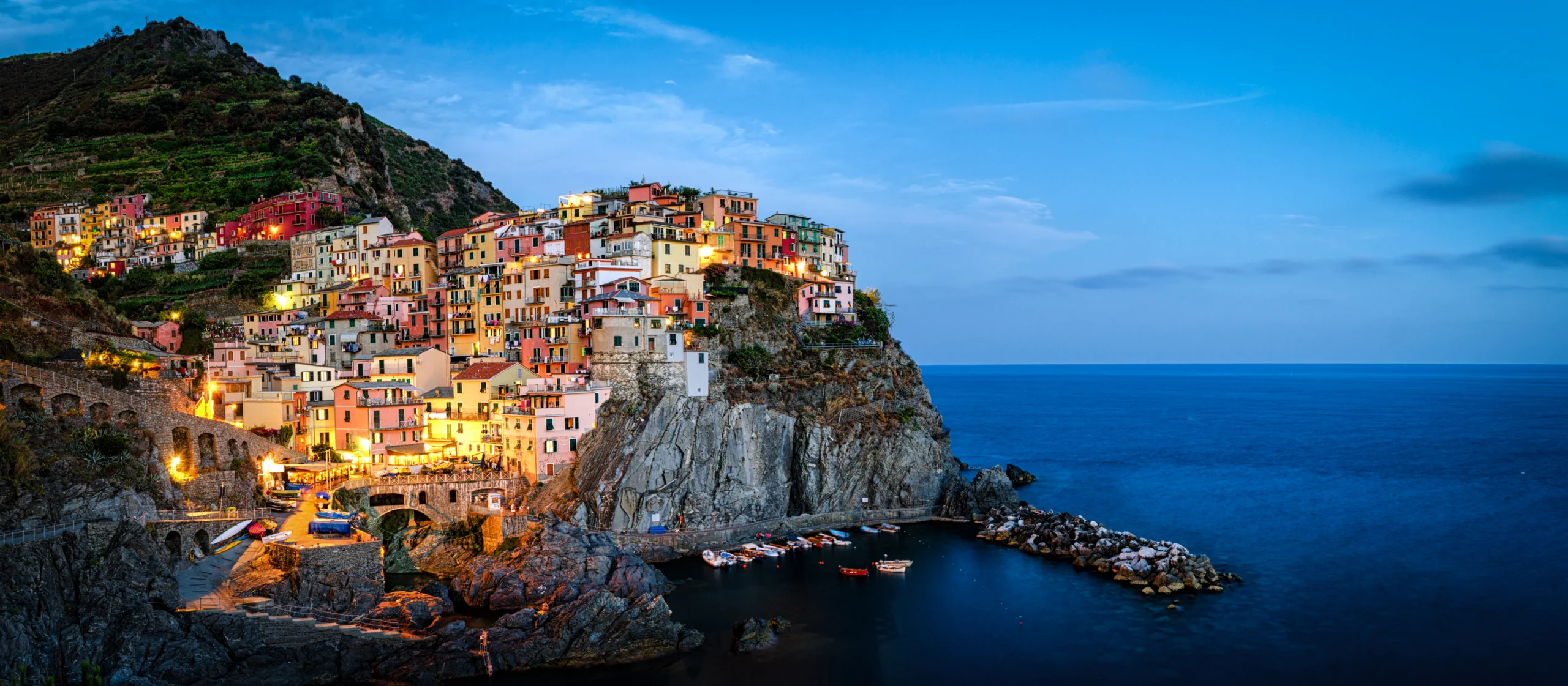 Manarola, Cinque Terre (Italian Riviera, Liguria) high definition panorama at twilight.