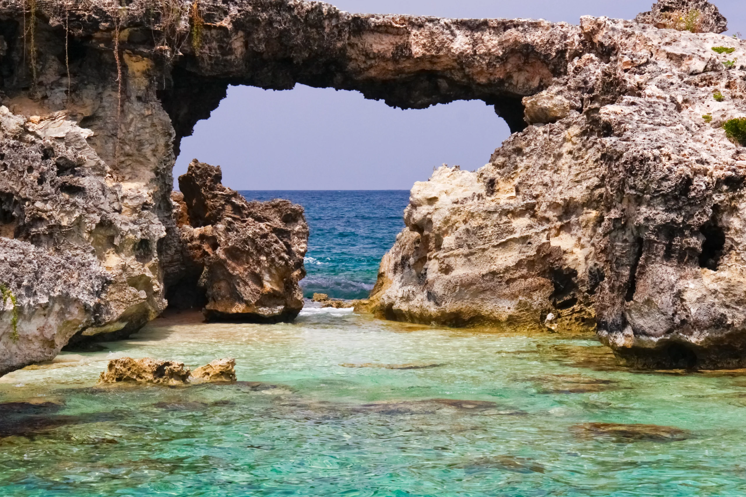 Devils Bridge is a unique geological formation of hard and soft limestone off the eastern shores of the Caribbean island of Antigua.