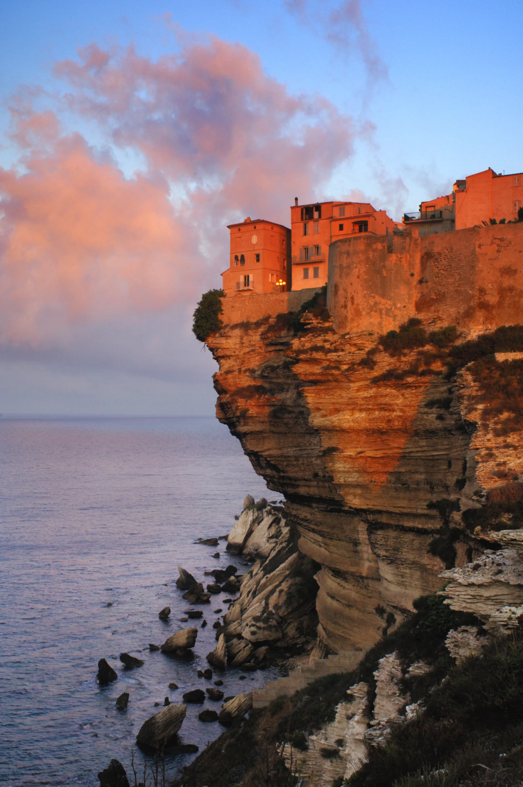 Sunrise at the cliffs and buildings at Bonifacio, Corsica, France.