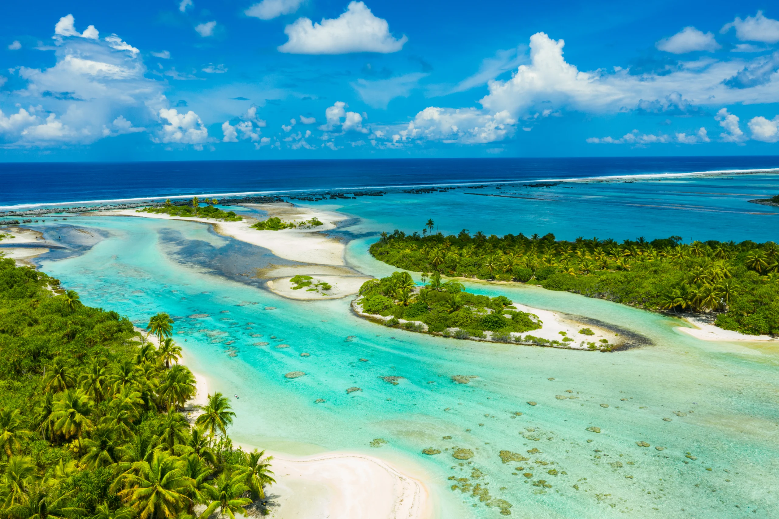 Rangiroa aerial image of atoll island reef motu in French Polynesia Tahiti.