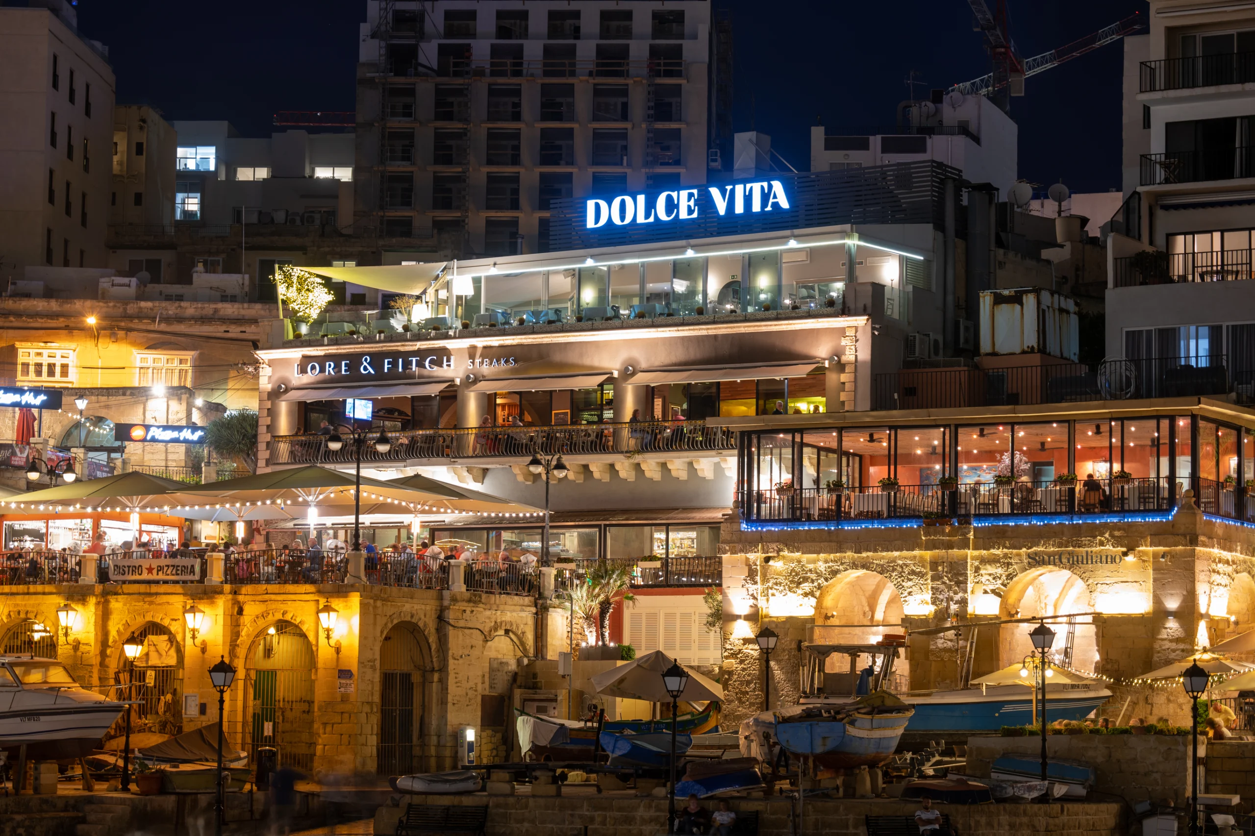 Restaurants in St Julian Town in Malta at Night.