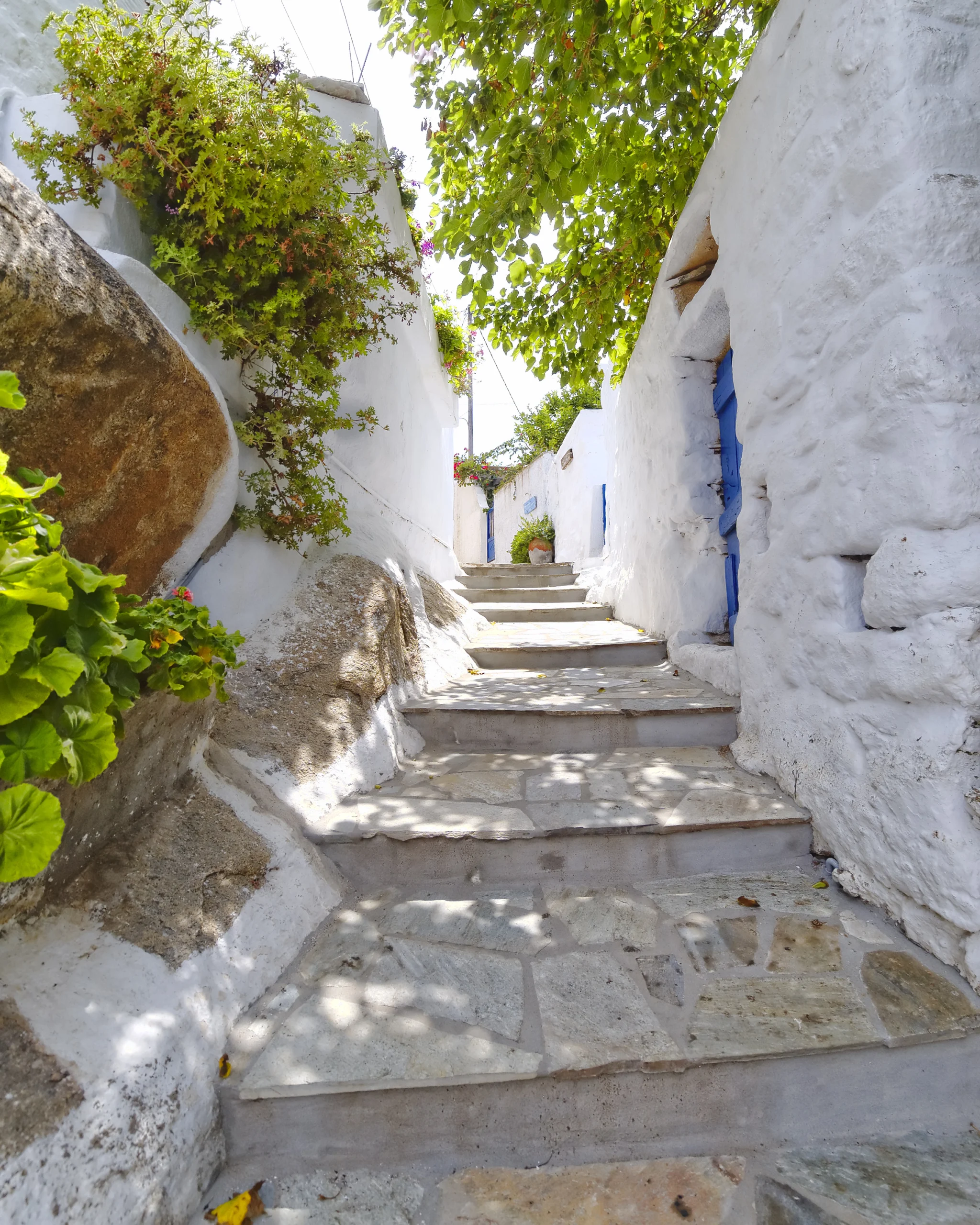 Picturesque alley, Tinos island, Greece.