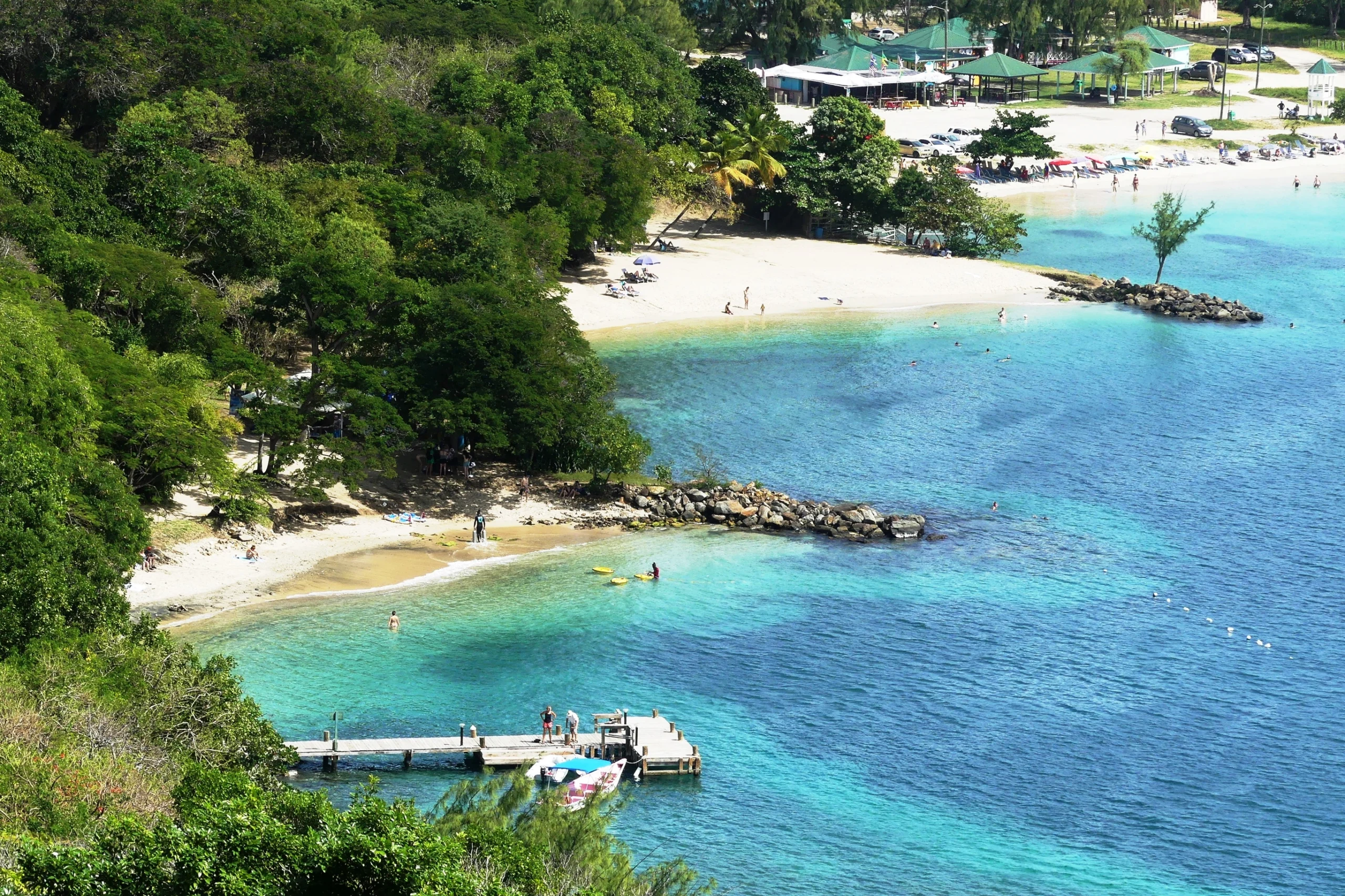 The beautiful blue colours of Pigeon Island Beach in Pigeon Island National Park at Gros Islet on the Caribbean island of St Lucia.