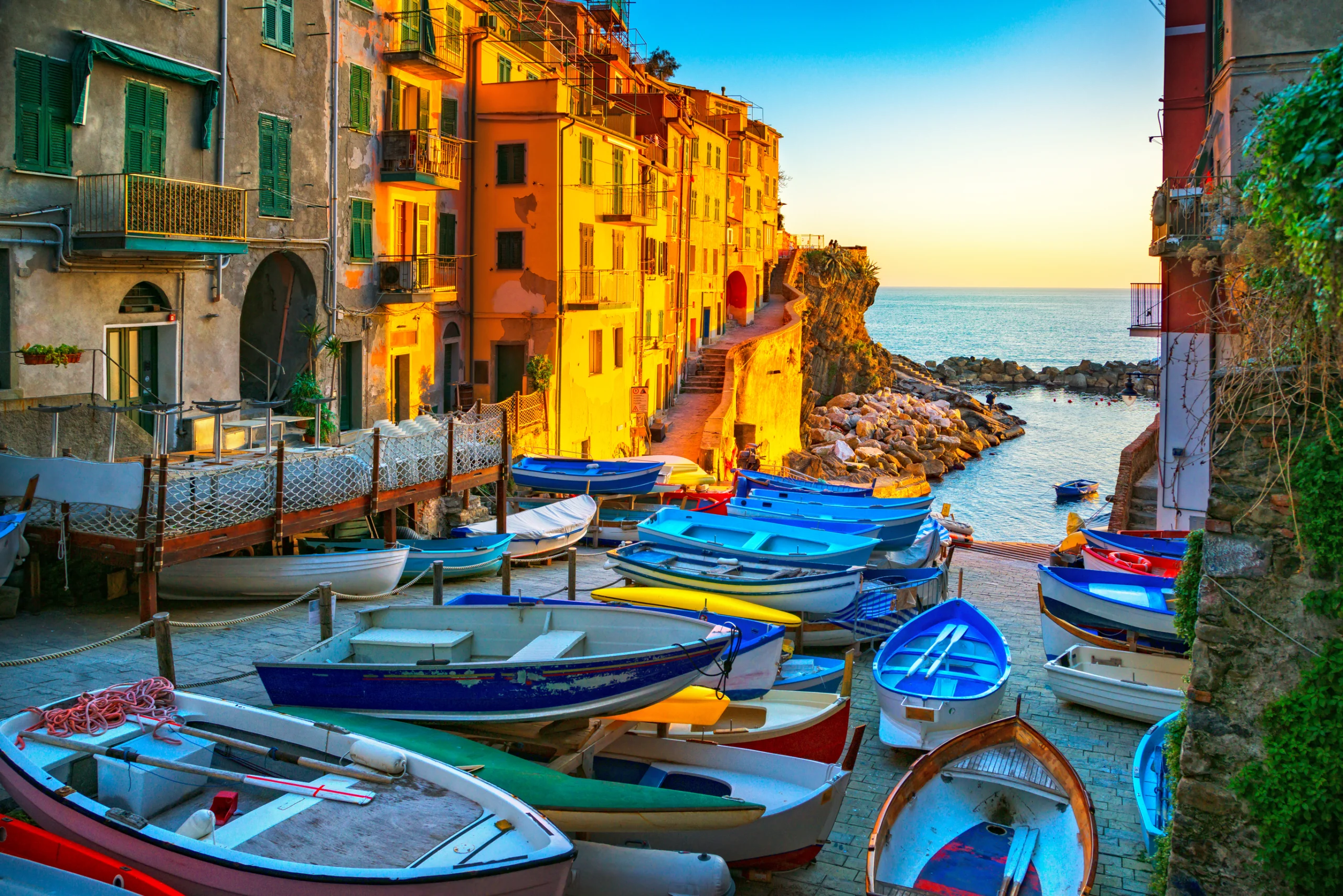 Riomaggiore village street, boats and sea