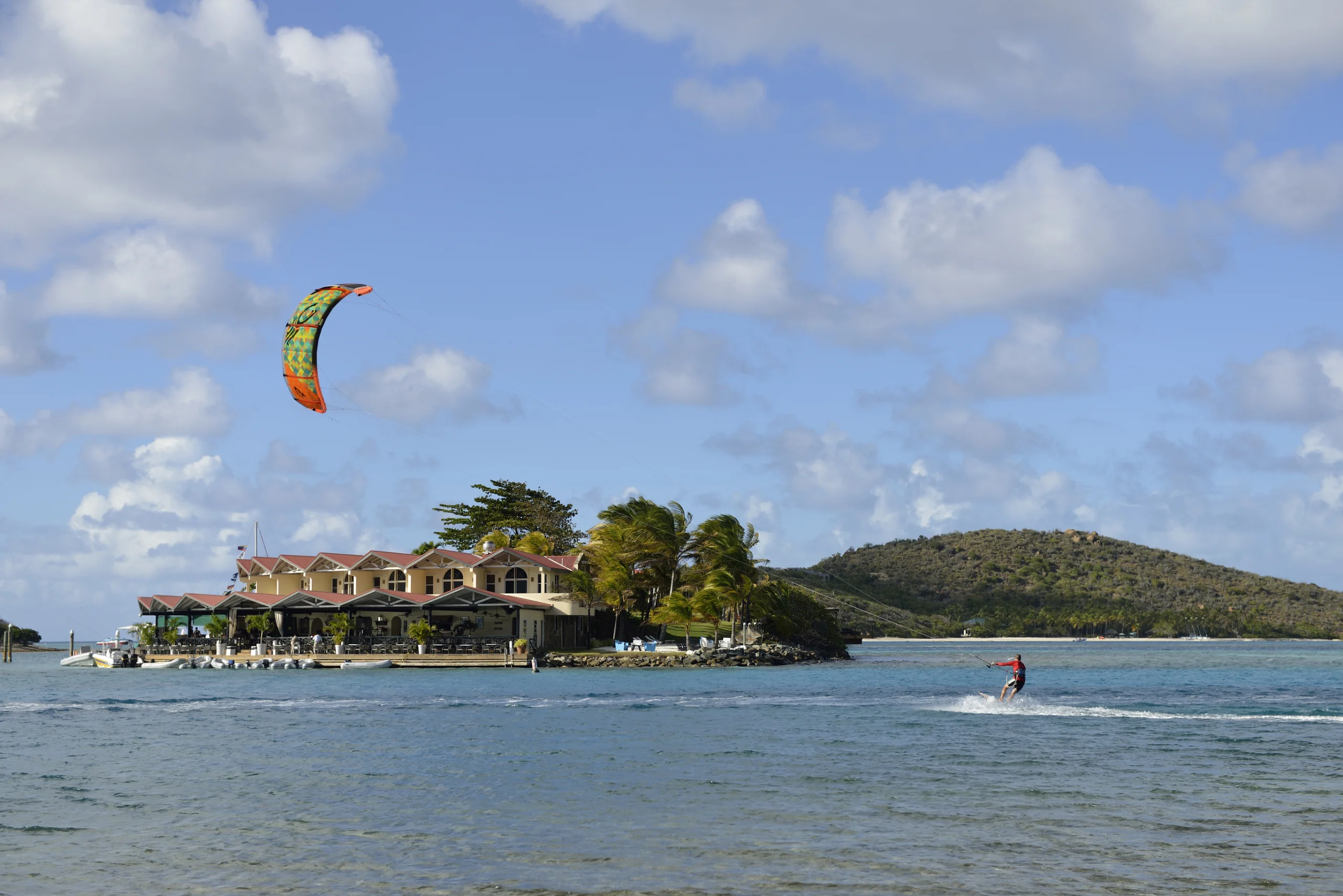 Kite surfing in front of Saba Rock, Virgin Gorda, British Virgin Islands