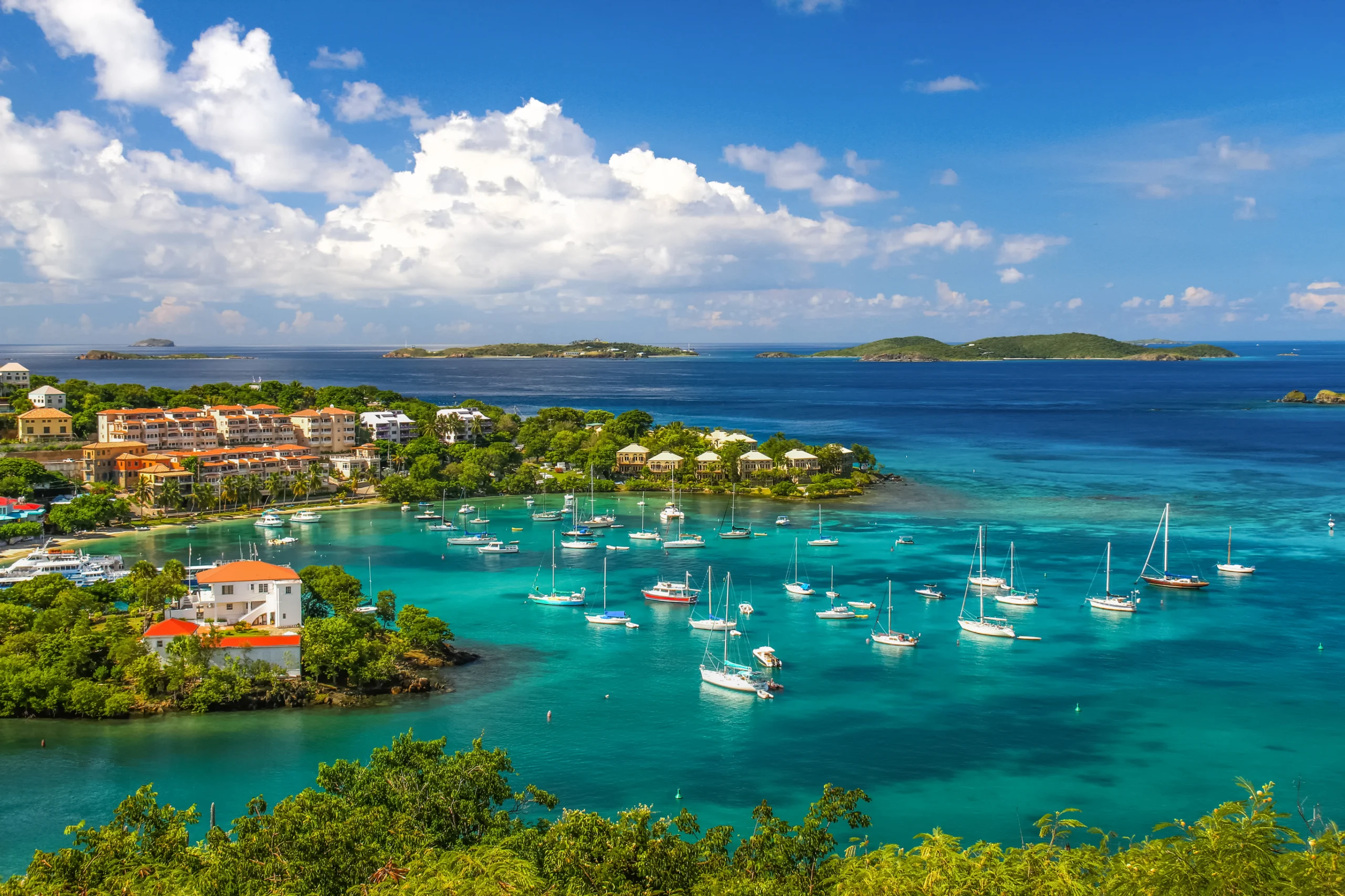 A wonderfully colorful view from above the fleet of sailboats and yachts anchored the harbor in Cruz Bay on the island of St. John