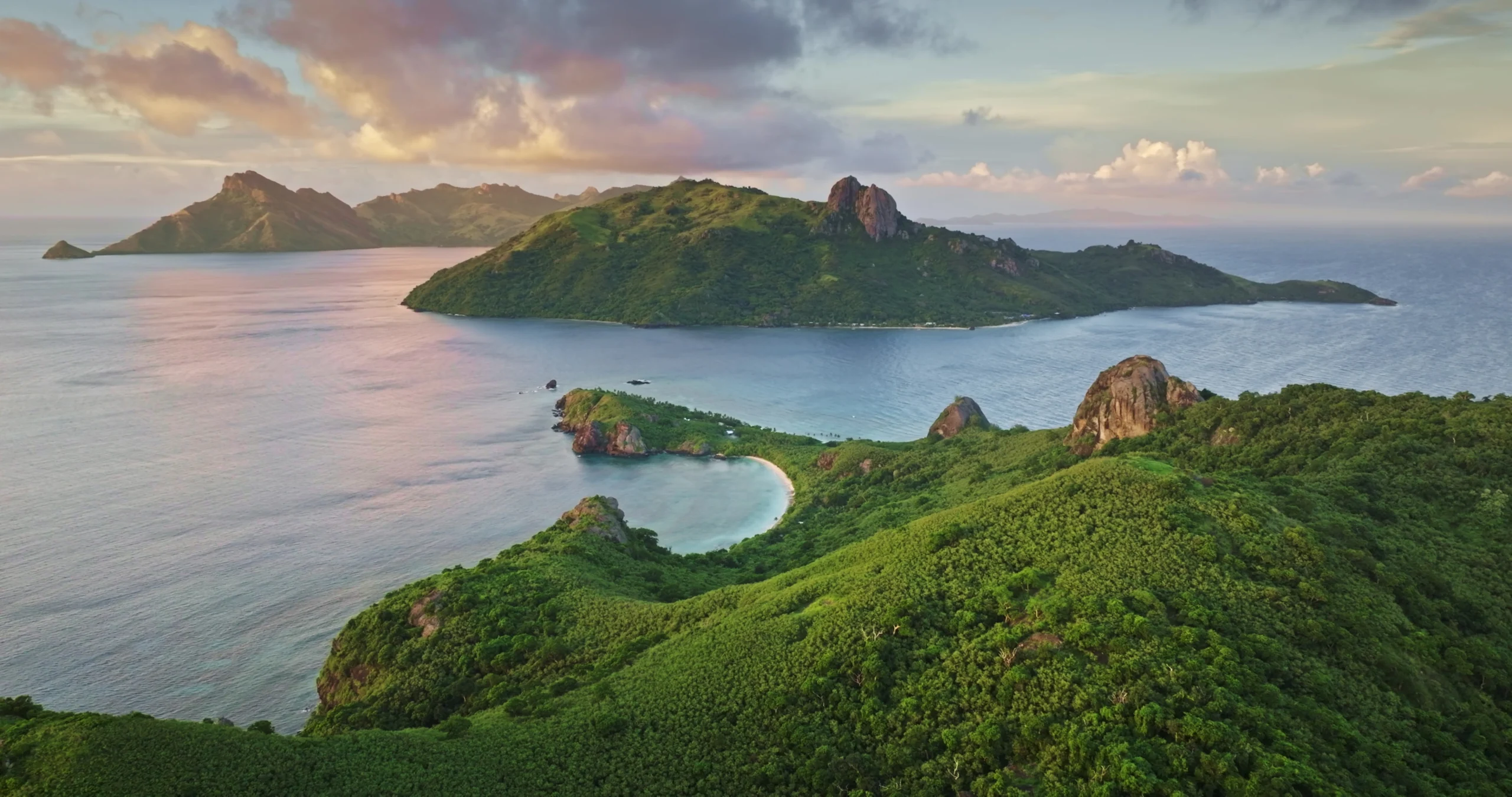 Fiji Yasawa Islands tropical coastal landscape at sunset.