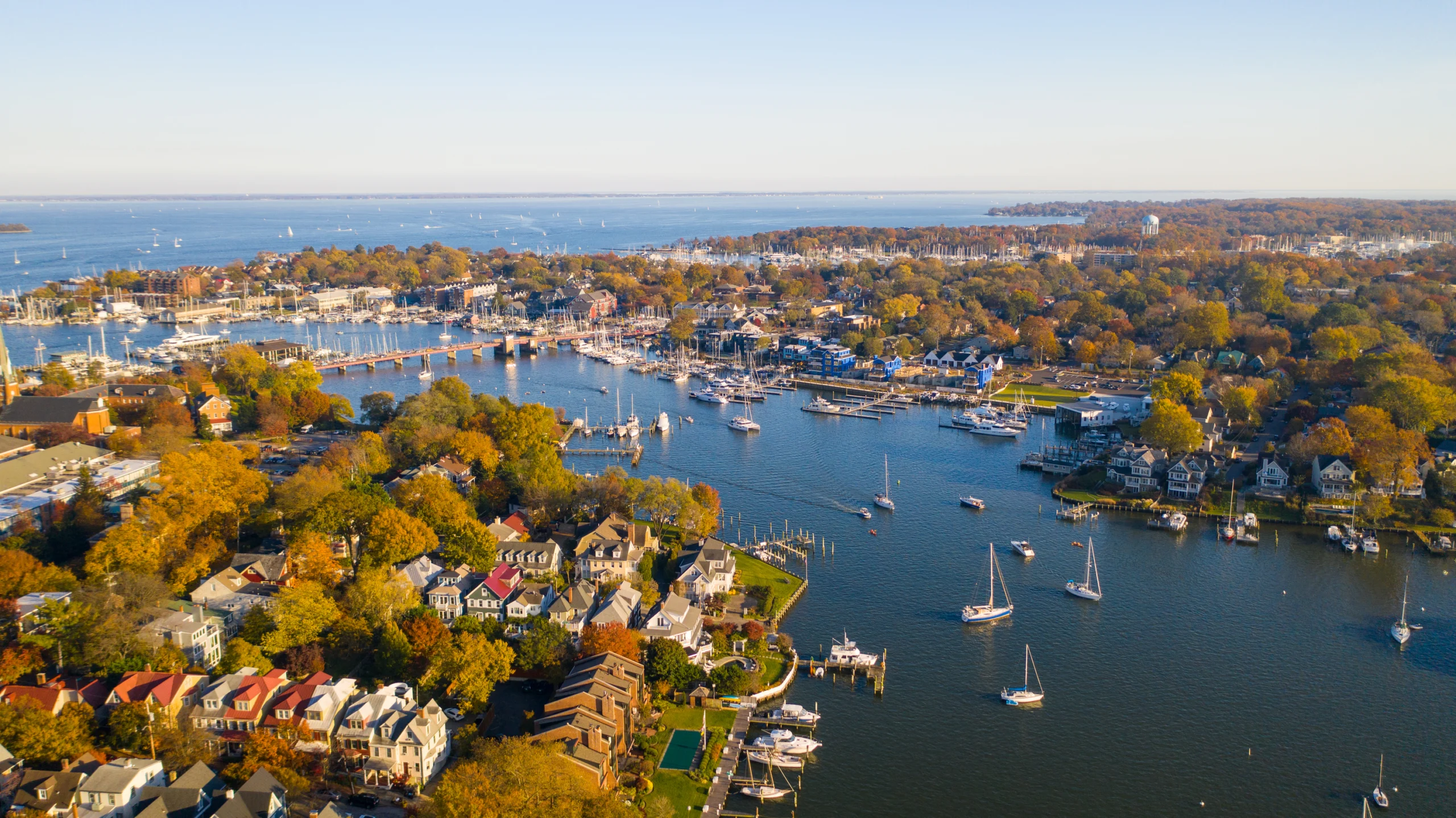 Fall foliage on Spa Creek, Annapolis, Maryland. Aerial view of colorful sailboat moorings and docks on Spa Creek, in historic downtown Annapolis Maryland on a fall day