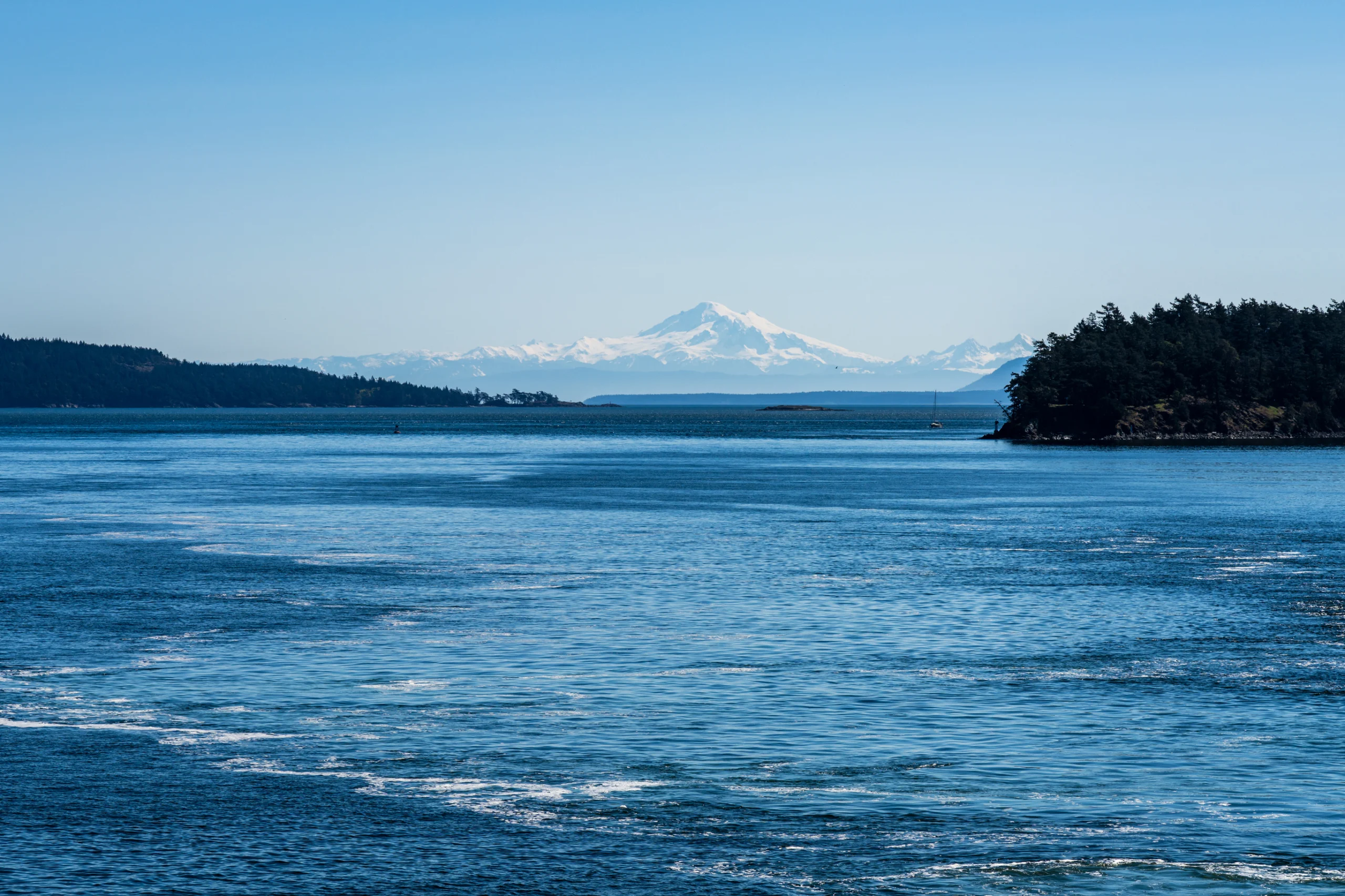 Southern Gulf Islands, Strait of Georgia. Snowcapped Mount Baker mountain in the background. British Columbia, Canada.