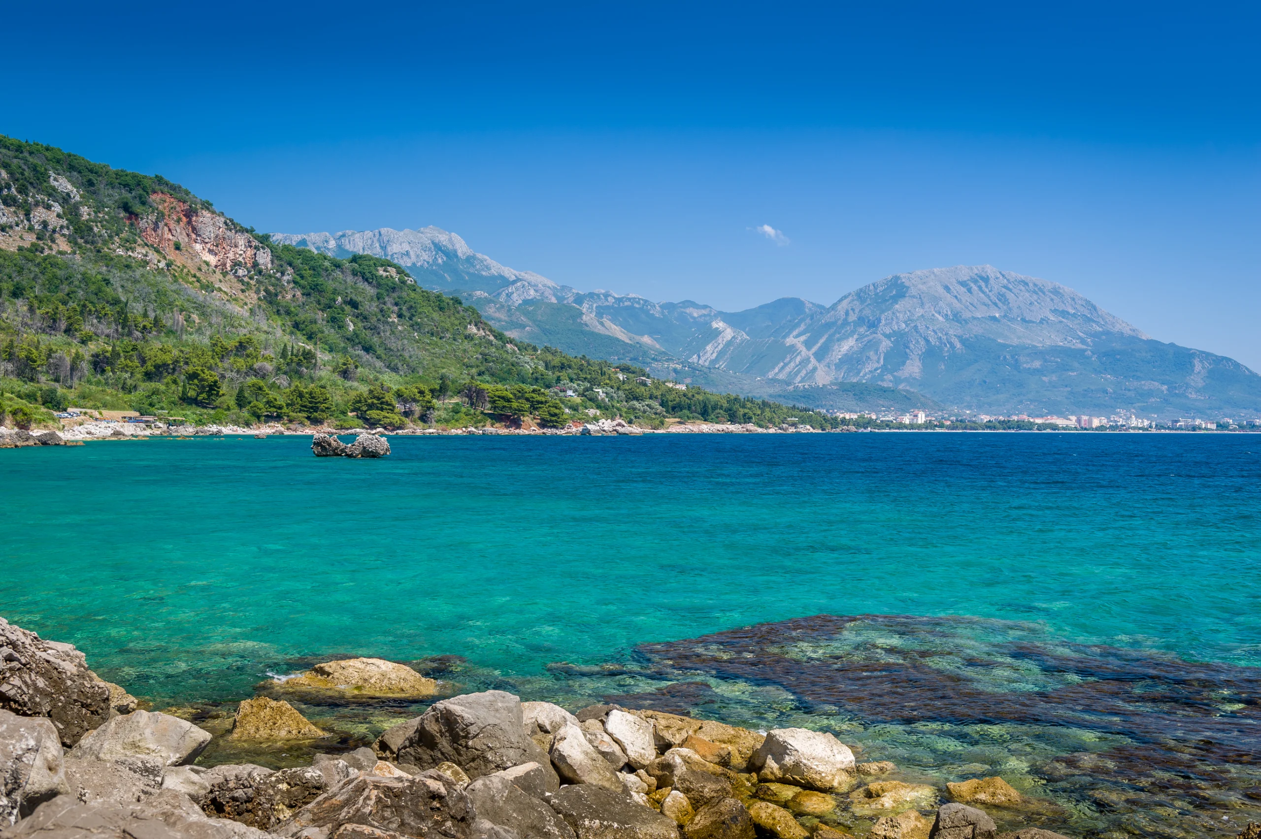 Montenegro coast seascape. Montenegro coast seascape near Sutomore and Bar towns and calm and sunny summer day.