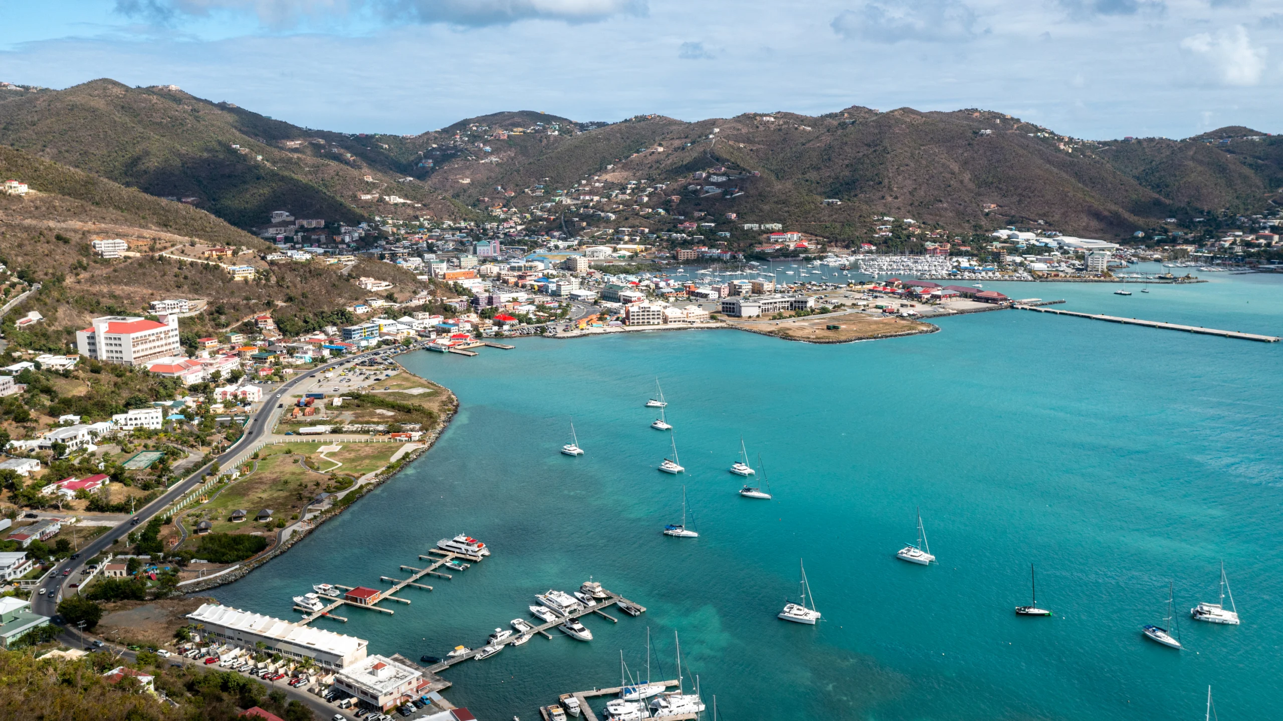 Aerial Photo - British Virgin Islands (BVI) - Norman Island. Drone photo from a sailing trip to Norman Island, BVI. The water is brilliantly blue and ideal for snorkeling and diving. Here's where it all started.